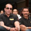 Sanjay Dutt and Ajay Devgn at Film 'Rascals' music launch at Hotel Leela in Mumbai