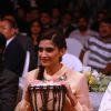 Sonam Kapoor playing the African drum at new range launch of Spice Mobiles in Mumbai
