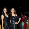 Malaika Arora Khan and Amrita Arora at Midnight Mass in Mumbai