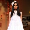A model displays a creation by designer Ashish Soni  during a special show at the Wills Lifestyle India Fashion week 2012,in New Delhi on Friday. .