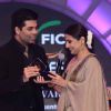 Vidya Balan and Karan Johar at the FICCI Frames Excellence Awards 2012. .