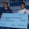Yatra.com CEO, Mr Dhruv Shringi, presented a token amount of Rs. 5 Lakh to Salman for Being Human at Yatra.com new brand campaign launch press conference in Mumbai. .