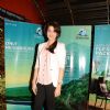 Actress Sagarika Ghatge poses for the photographers during the Share Your Travel Experience Contest in Mumbai. .