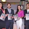 Bollywood actress Malaika Arora with writers Shobhaa De and Chetan Bhagat at Mercedez Benz magazine anniversary issue launch in Crossword Mumbai .