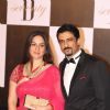 Sanjay Suri with wife at Amitabh Bachchan's 70th Birthday Party at Reliance Media Works in Filmcity