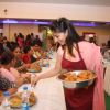 Tanisha serving bhog at North Bombay Sarbojanin Durga Puja 2012 in Juhu, Mumbai.