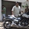 John Abraham gifts his favourite bike to director Sanjay Gupta