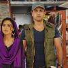 A still of Rati Pandey and Rohit Roy in Hitler Didi
