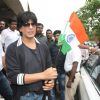 Shahrukh Khan holds the national flag