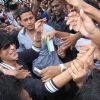 Fans crowd around Shahrukh Khan for an autograph,a hand shake or just a glimpse