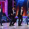 Manish Paul and Ram Charan perform together as others watch