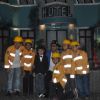 Shahrukh Khan poses with his team of fire fighters