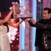 Salman hands over Gauhar the Bigg Boss Saat 7 throphy