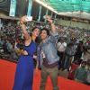 Nargis and Varun get a selfie of themselves with the crowd