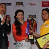 Soha Ali Khan felicitates a winner of the Classmate Spell Bee 2014