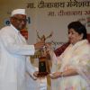 Lata Mangeshkar felicitates Anna Hazare at the 72nd Master Deenanath Mangeshkar Awards