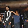Arjan Bajwa felicitates a winner at the Grand finale of 'Mr India 2014'