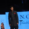 Tanuj Virwani walked the ramp at the 'Caring with Style' fashion show at NSCI