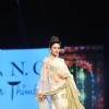 Yuvika Chaudhary walked the ramp at the 'Caring with Style' fashion show at NSCI