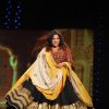 Malishka walks the ramp at the 'Caring with Style' fashion show at NSCI