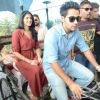 Armaan and Deeksha travelling by cycle rickshaw to avisit Jal Mahal in Jaipur