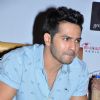 Varun engrossed in questions at the Press Meet