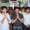 Aditya Thackeray and Madhur Bhandarkar pray before the lightning of the lamp