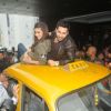 Varun Dhawan and Alia Bhatt take a ride on top of a cab at Kolkata