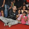 Varun Dhawan interacting with his younger fans