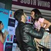 Varun lifts his younger fan at the Promotions of Humpty Sharma Ki Dhulania at Rcity Mall
