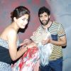 Parvathy Omanakuttan and Akshay Oberoi with a scary man
