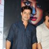 Sushant Singh poses for the cameras at the Promotions of Hate Story 2