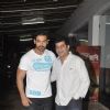 John Abraham with a guest at the Screening of Lai Bhari