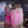 Dia Mirza walk the ramp with model at the Teach for Change 2014 Fashion Show