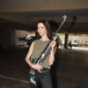 Claudia Ciesla stikes a pose with a gun at the Promotions of Desi Kattey