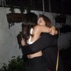 Surveen Chawla hugging Keerti Kelkar at the Screening of Hate Story 2