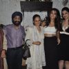 Surveen Chawla poses with family at the Screening of Hate Story 2