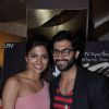 Parvathy Omanakuttan poses with Akshay Oberoi at the Premier of Pizza 3D