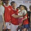 Aamir Khan lifts a kid at Charity Football Match