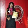 Nisha Jamwal receives the award at the India Leadership Conclave