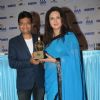 Poonam Dhillon presenting an award at the International Indian Achiever's Award 2014