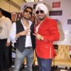 Mika and DJ Dilbagh Singh pose for the media at the Album Launch
