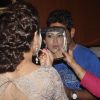 Mansha does a touch up to her make up at the Trailer Launch of Spark