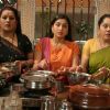 Parul, Jalpa and Rajeshwari stolling food from the kitchen