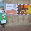 A Student holding the banner at NDTV Save The Tigers Contest