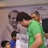 Sachin Tendulkar greets a young fan at Durgapur Tribute Book Launch
