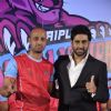 Abhishek Bachchan poses with a team member from his Kabbadi Team