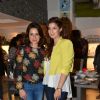 Neelam Kothari poses with Twinkle Khanna at The White Window