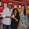 Rj Malishka poses with Akshay and Tammanah at the Promotion of Entertainment on Red FM