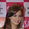 Dia Mirza was captured with a sweet smile at the Launch of New Savvy Cover